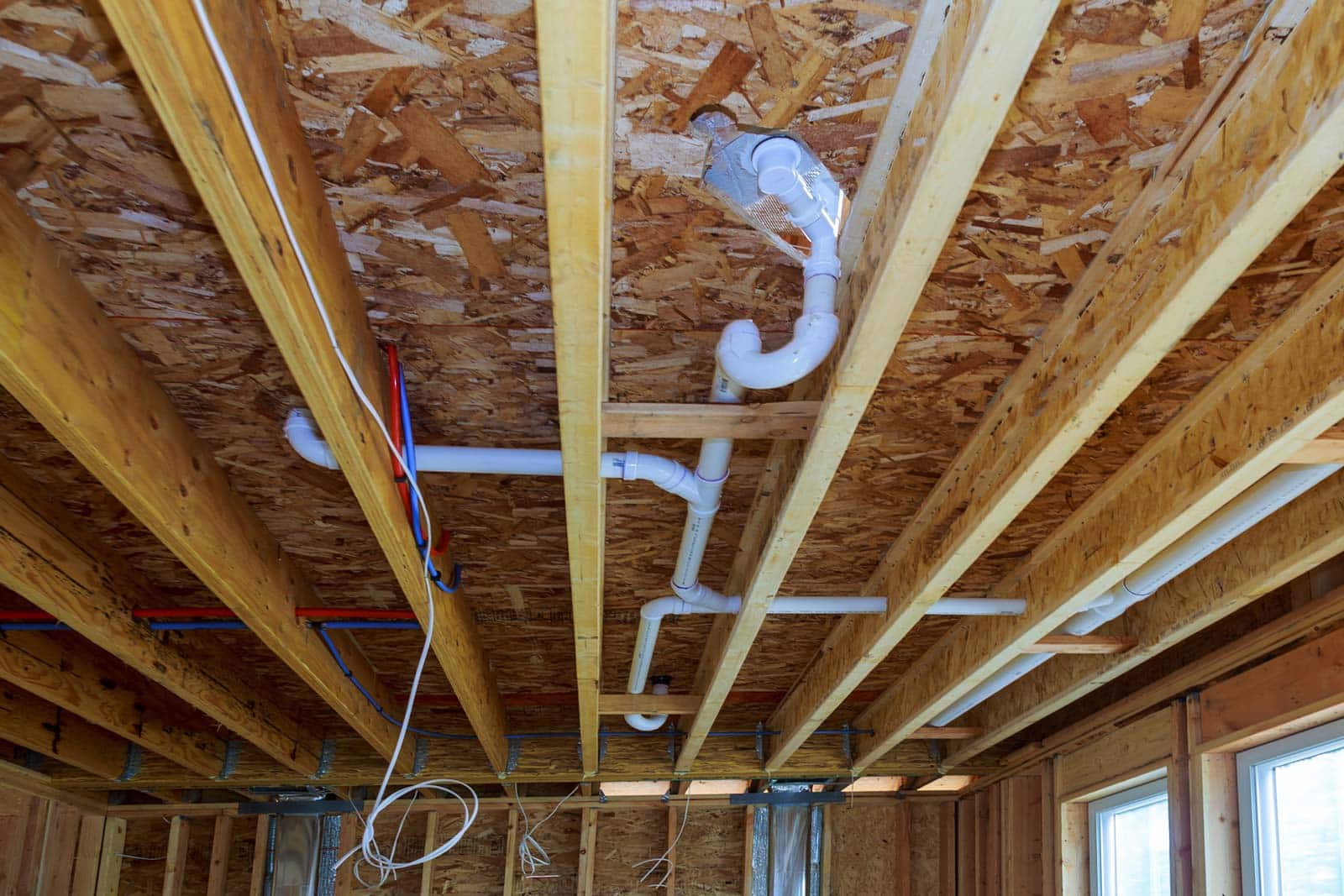 new plumbing installation in basement of home