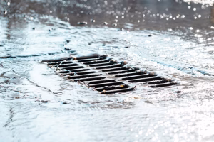 storm drain grade while raining